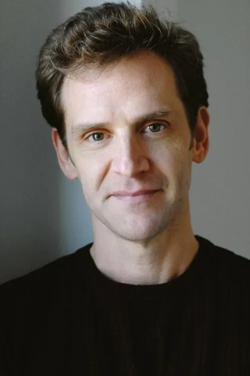 Malcolm Gets interpretando a Timothy Schultz