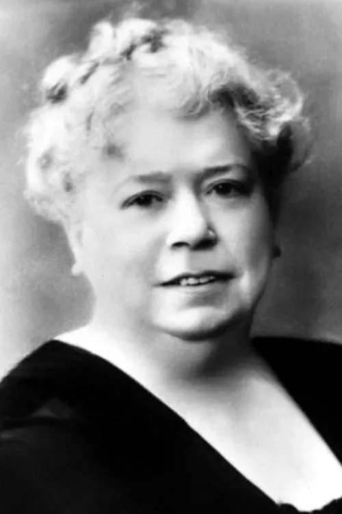 Mary Brough interpretando a Mrs. Gather