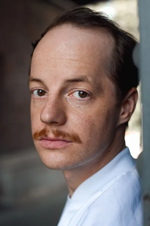 Merlin Sandmeyer — personaje: Frank