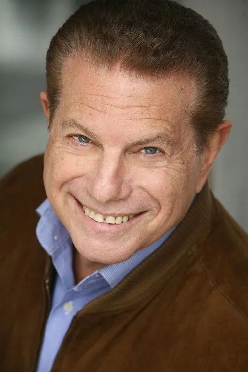 Mike Burstyn interpretando a Robbie Stewart