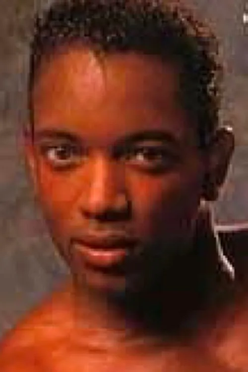 Mitch Green interpretando a (archive footage)