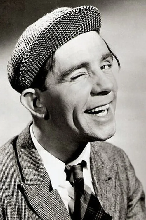 Norman Wisdom interpretando a
