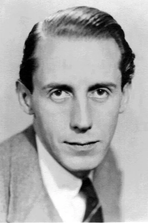 Patrick Ludlow interpretando a Background performer (Police)