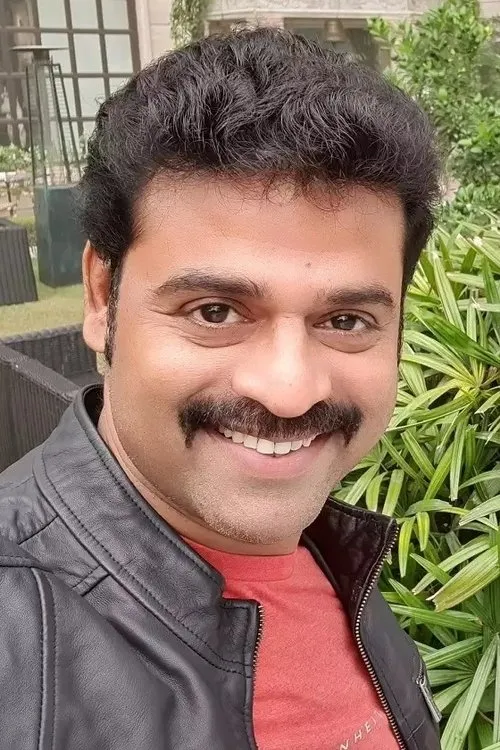 Prem — personaje: Natesan