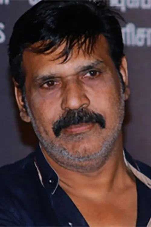 Raj Kapoor interpretando a Rajadurai