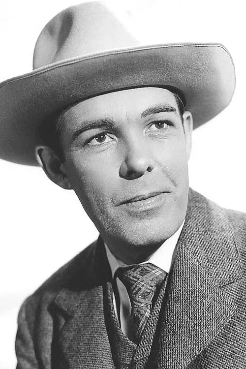 Richard Bailey interpretando a Andrew Vaning