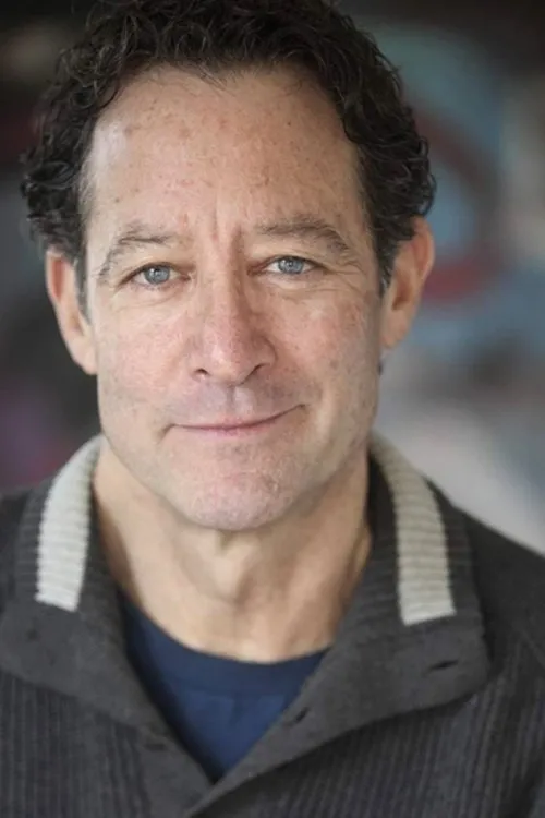 Richard Neil interpretando a John Brennan