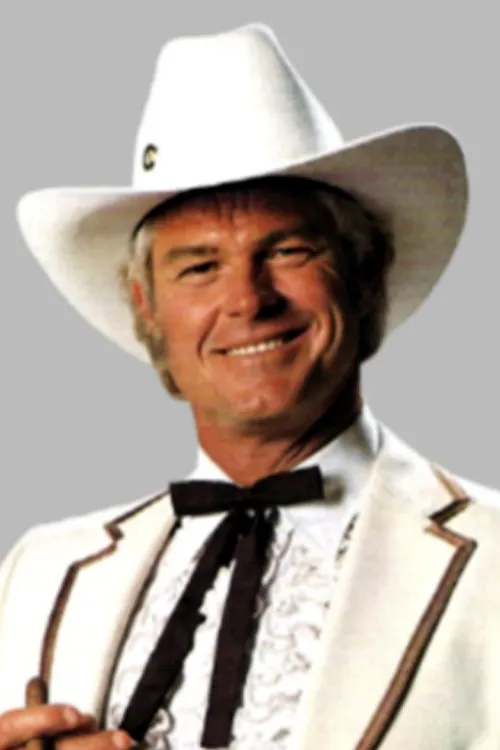 Robert Welch interpretando a Col. Rob Parker