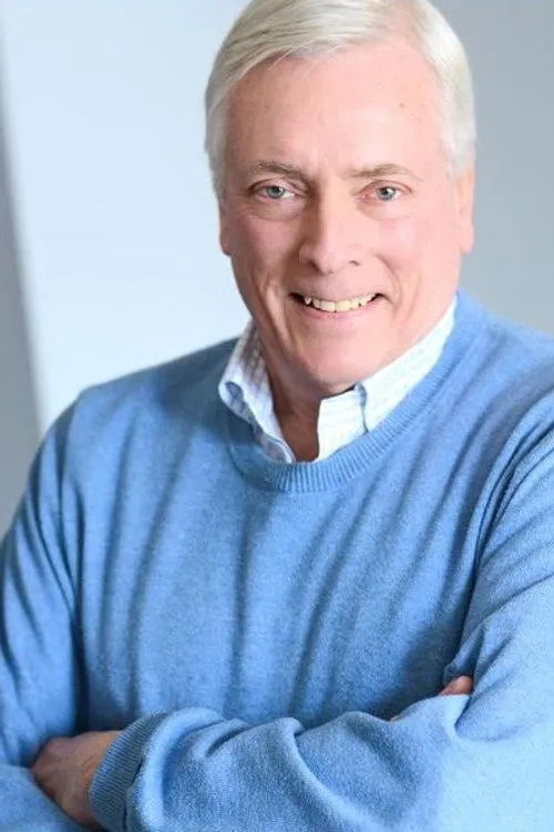 Ron Beecher interpretando a Tim Grunwald