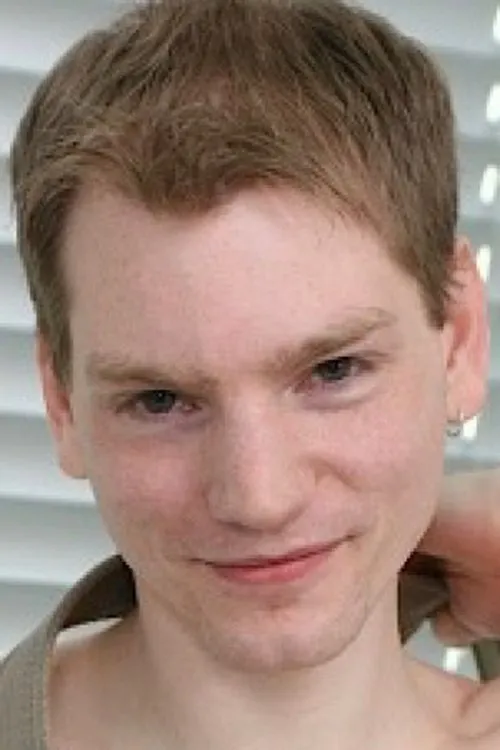 Sam Slade interpretando a 