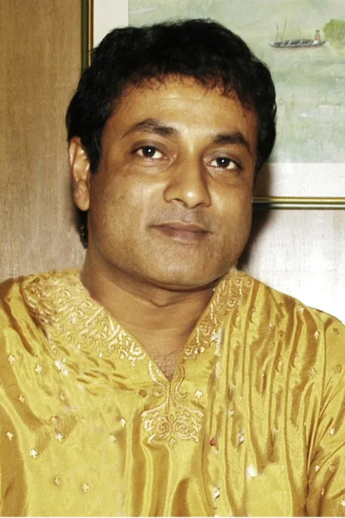 Shadhin Khasru interpretando a Ashalata's husband