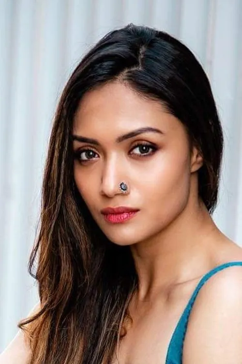 Shruti Das — personaje: Radhika ("Round Two" Segment)