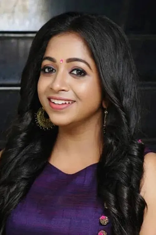 Sneha Babu — personaje: Archana Achu