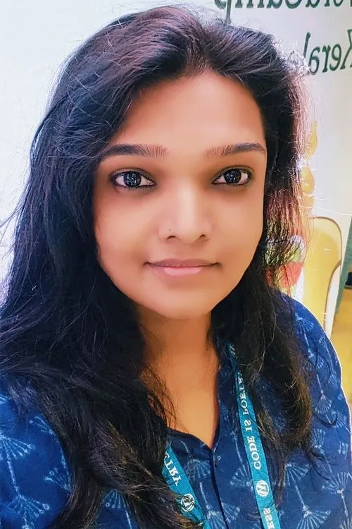 Sukanyeah Krishna interpretando a Dhanam