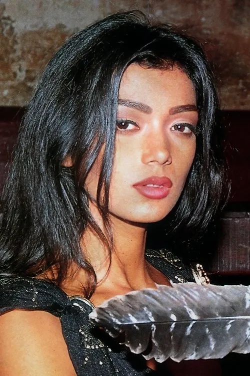 Tabatha Cash interpretando a (archive footage)