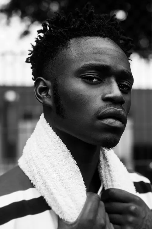 Tama Theophore Kabeya — personaje: Blackson