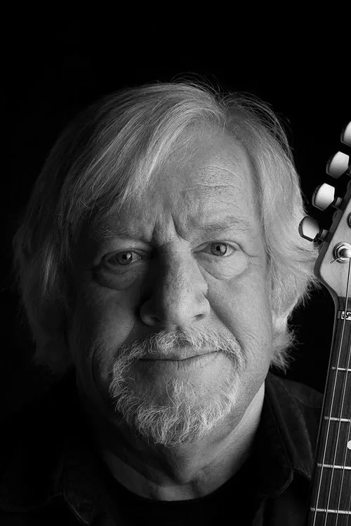 Tim Renwick interpretando a Self