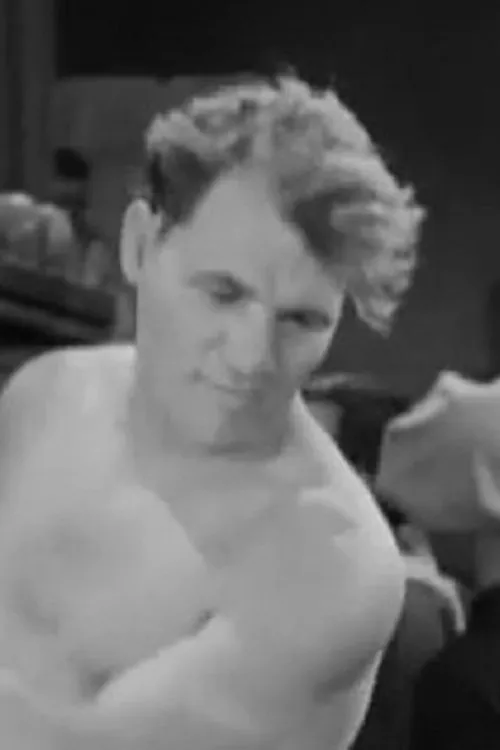 Tom Dempsey interpretando a Train passenger