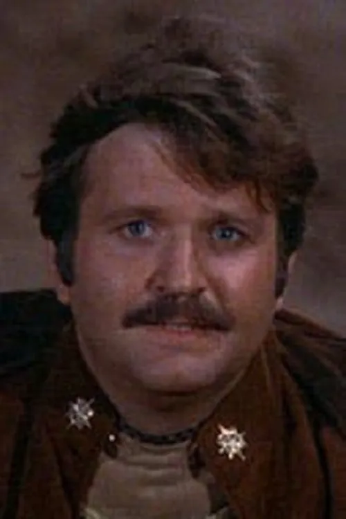 Tony Swartz interpretando a Harry Blackwood