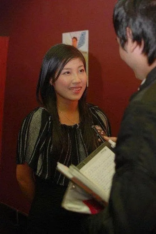 Trang Thu interpretando a Mi