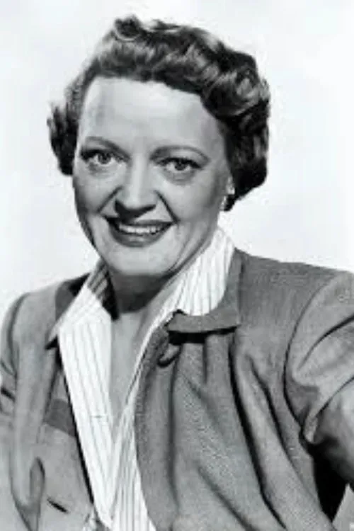 Vivi Janiss interpretando a Ms. Fleming