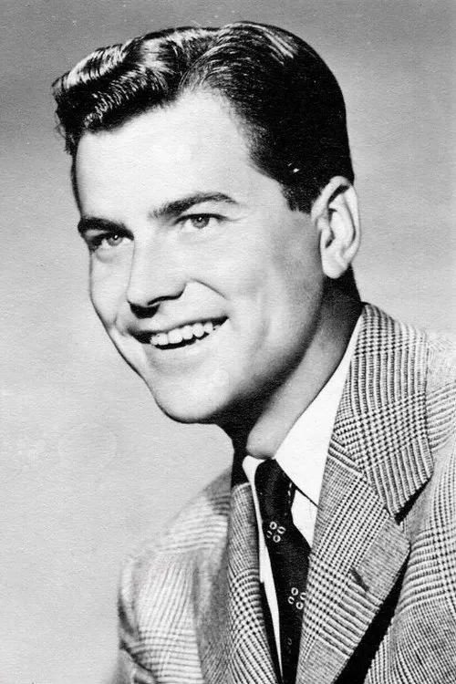 Warren Douglas interpretando a Joe Hilton