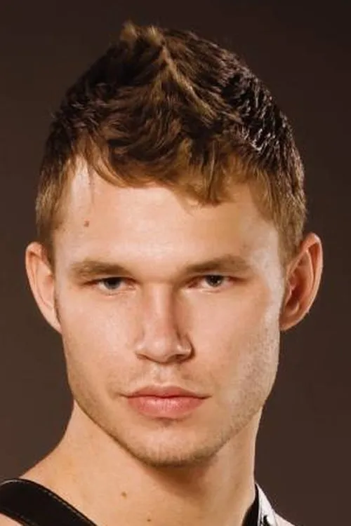 Zach Alexander interpretando a 