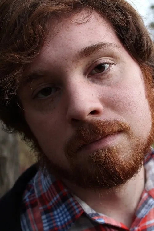 Zachary Steere interpretando a Dinosaur Suit Performer