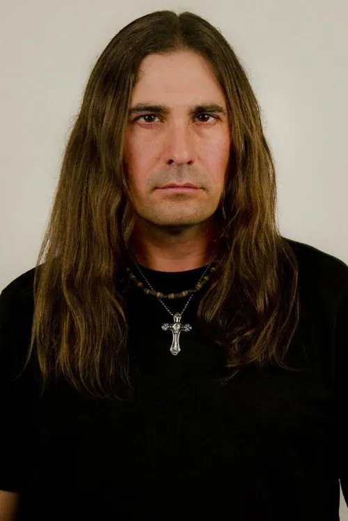 Zak Stevens interpretando a Self (archive footage)