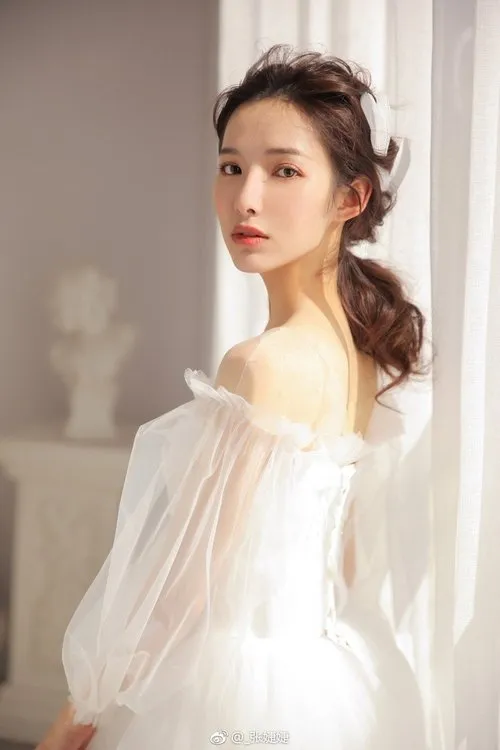 Zhang Jie — personaje: Xiao Jingque