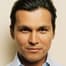 Adam Beach como E.O. McGinnis