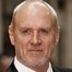 Alan Dale como Australian Ambassador