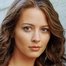 Amy Acker como Kelly Peyton