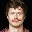Anders Holm como JJ