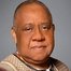 Barry Shabaka Henley como Linton Bell