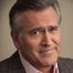 Bruce Campbell como Sam Axe