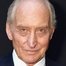 Charles Dance como Tywin Lannister