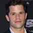 Charlie Carver como Scott Frost