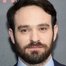 Charlie Cox como Adam Lawrence