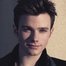Chris Colfer como Kurt Hummel