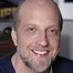 Chris Elliott como Chris Monsanto