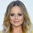 Emily Atack como Sarah Stratton