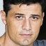 Enver Gjokaj como Clark Evans