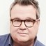 Eric Stonestreet como Cameron Tucker