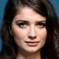 Eve Hewson como Amelia Sacks
