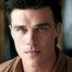 Finn Wittrock como Edmund Tolleson