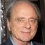 Harris Yulin como Buddy Dieker