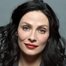 Joanne Kelly como Nadia Ramadan