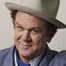 John C. Reilly como Jerry Buss