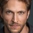 Jon Cor como Hodge Starkweather